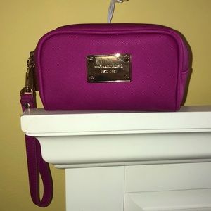 Michael Kors Wristlet (New condition)